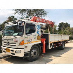 Truck for rent next to trucks